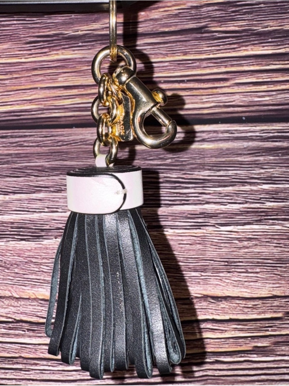 Coach Black Leather Tassel Keychain with Pink Collar and Gold Hardware